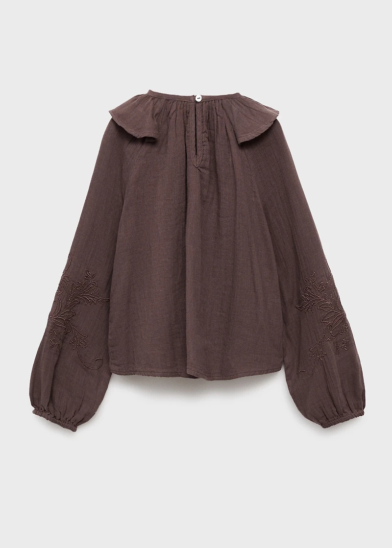 Ruffled embroidered blouse