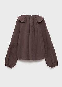 Ruffled embroidered blouse