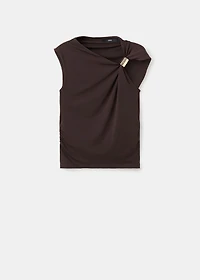 Top with asymmetrical neckline and metallic detail