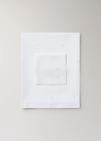 100% cotton tablecloth with embroidered star details for 6 to 8 diners