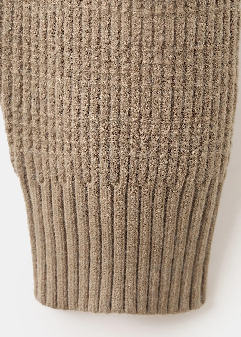Structured knitted sweater