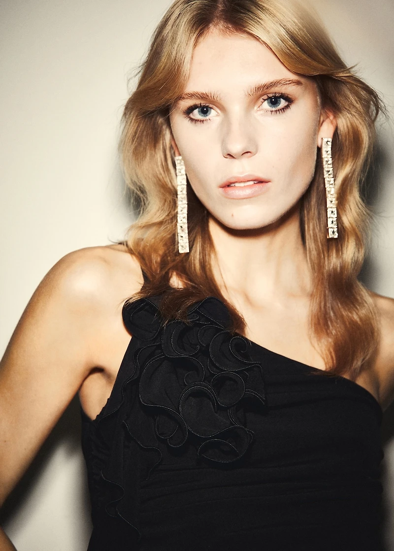 Ruched asymmetrical top with ruffle trim