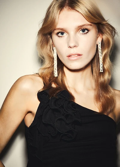 Ruched asymmetrical top with ruffle trim