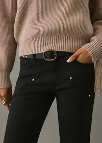 Flared jeans with studs