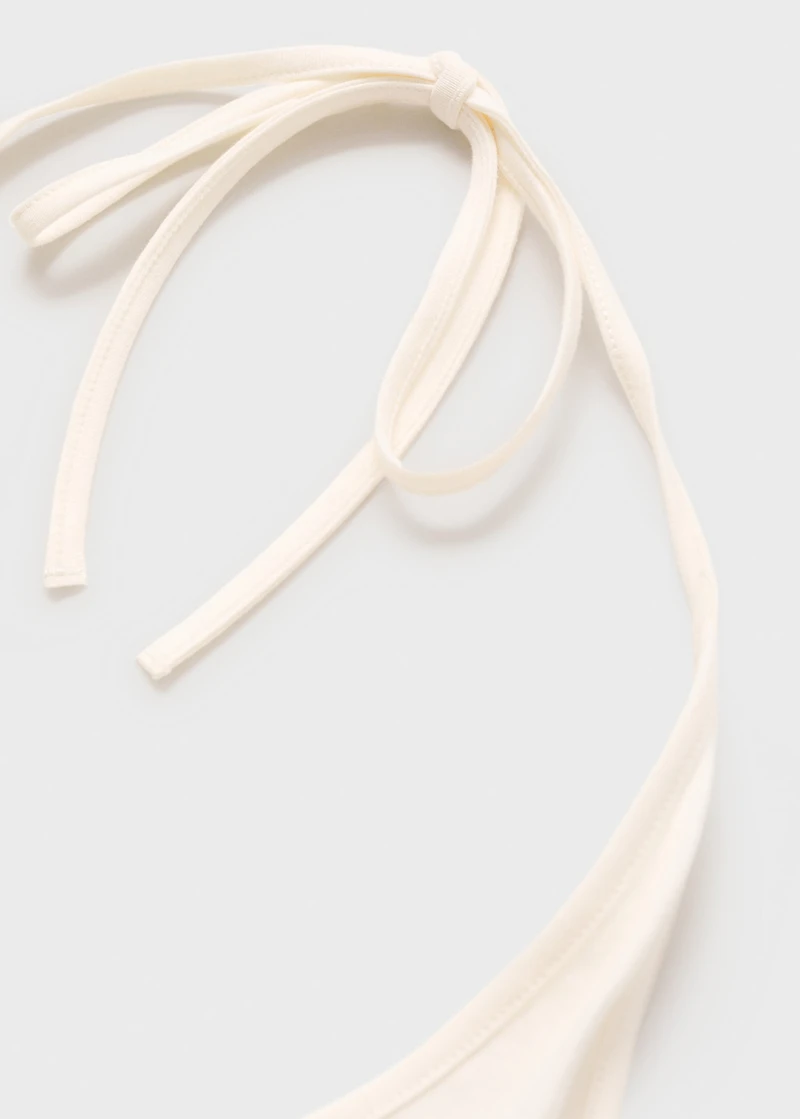 Halter neck top with metallic appliqués