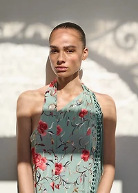 Asymmetrical dress with embroidered fringes