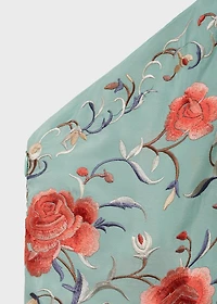 Asymmetrical dress with embroidered fringes