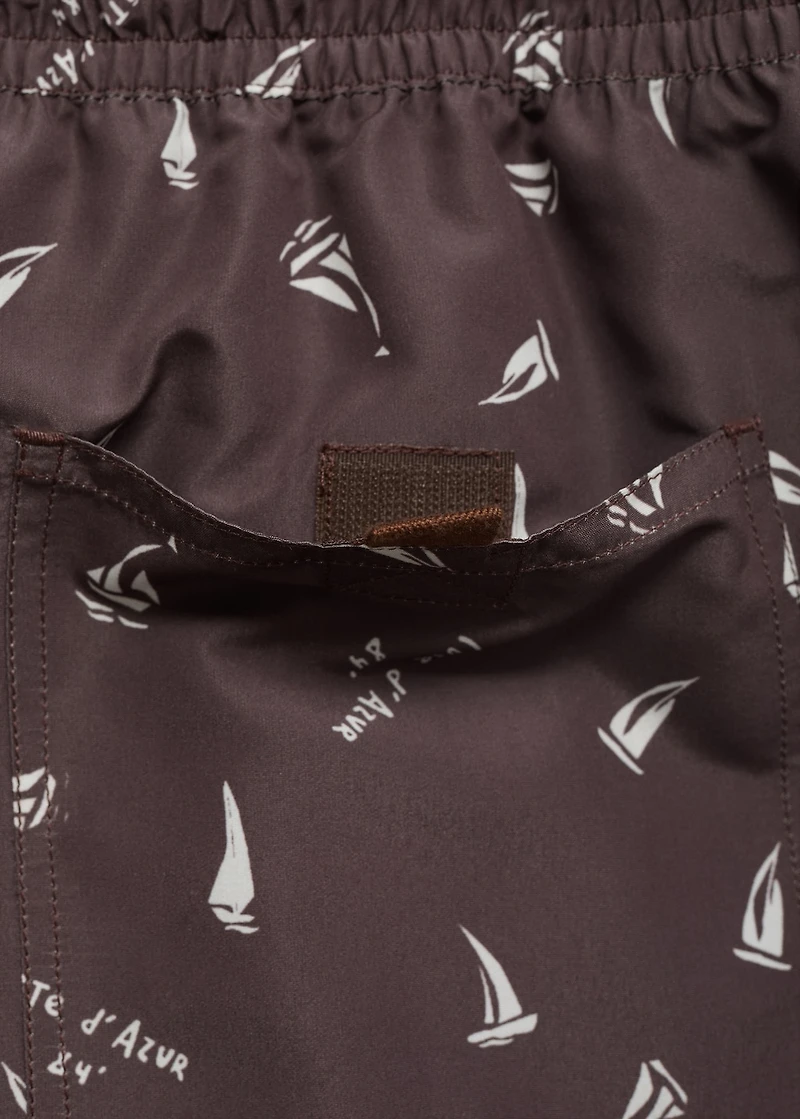 Swimsuit with sailboat print