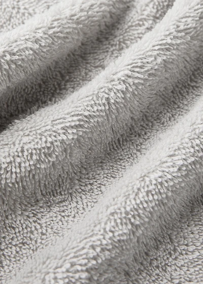 Washbasin towel with striped trim