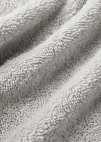 Washbasin towel with striped trim