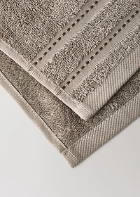 Cotton guest towel with embroidered dots