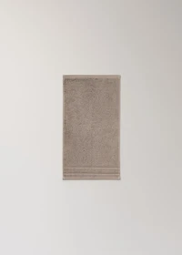 Cotton guest towel with embroidered dots