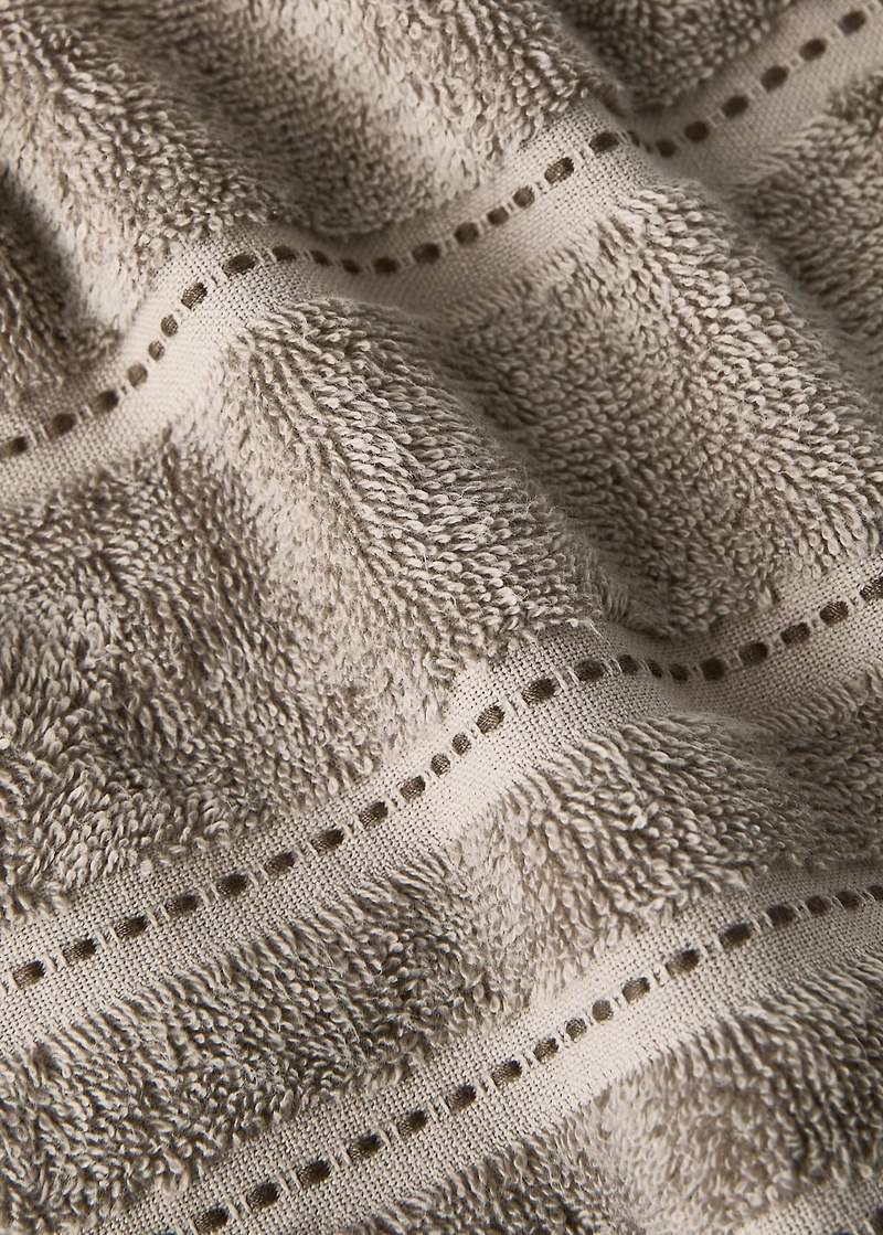 Cotton washbasin towel with embroidered dots