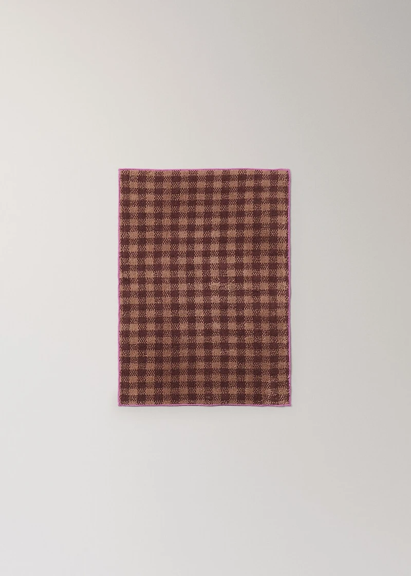 Cotton check-print guest towel with overlock stitching