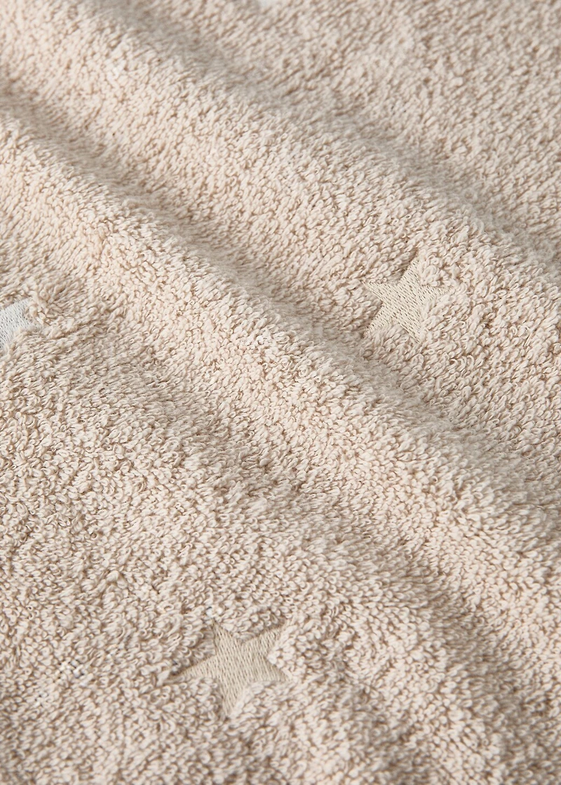 Children's bath towel with glow-in-the-dark stars