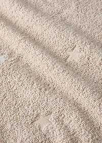 Children's bath towel with glow-in-the-dark stars