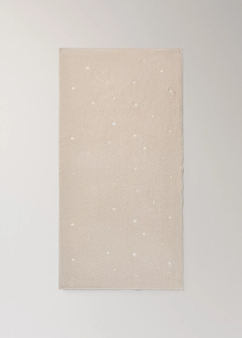 Children's bath towel with glow-in-the-dark stars