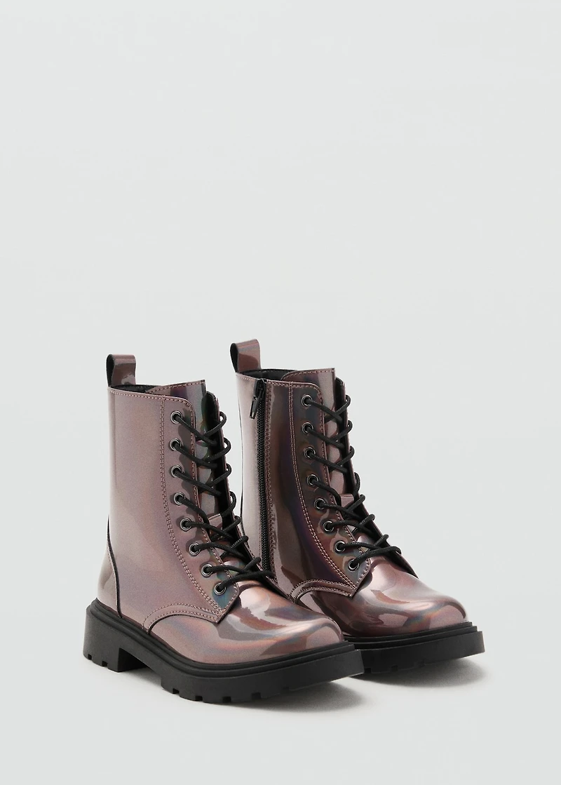 Zipped metallic boots