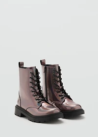 Zipped metallic boots