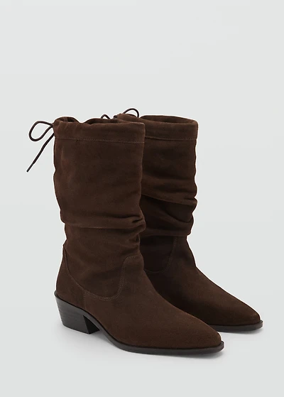 Knee-high leather boots with ruched detail