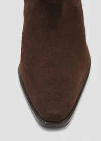 Knee-high leather boots with ruched detail