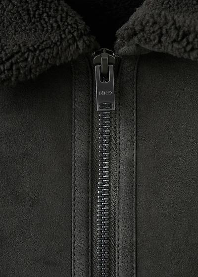 Double face jacket with sheepskin details