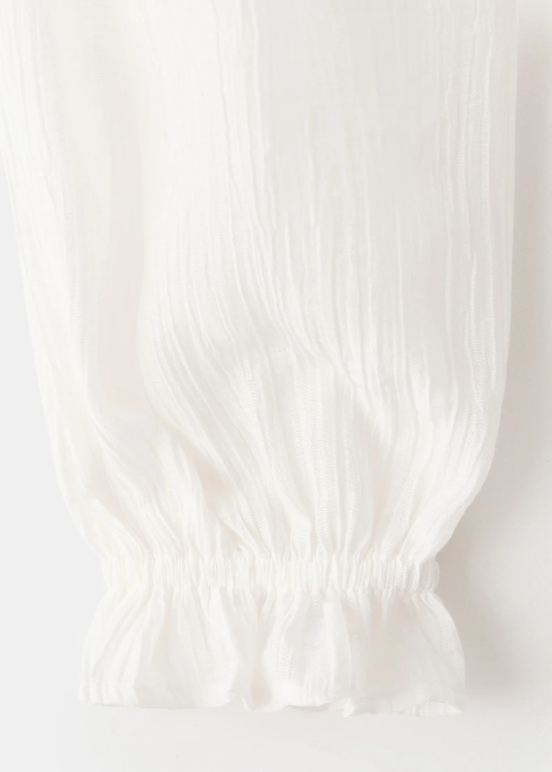 Fluid ruffled blouse