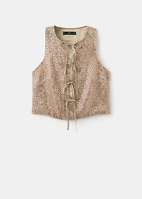 Top with sequins and bow