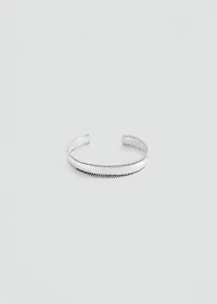 Rigid bracelet with relief