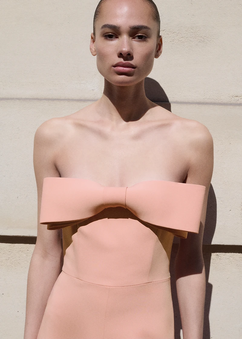 Strapless jumpsuit with bow neckline