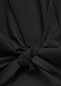 Crop top with bow on the back