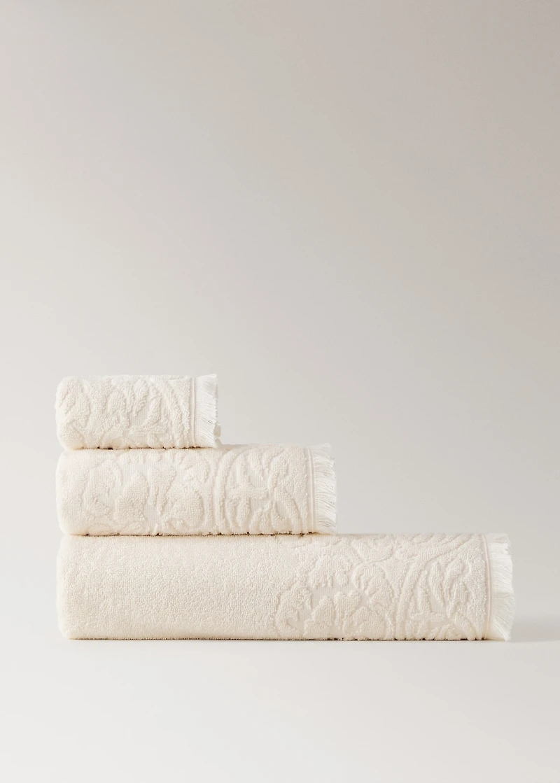 Hand towel with floral trim