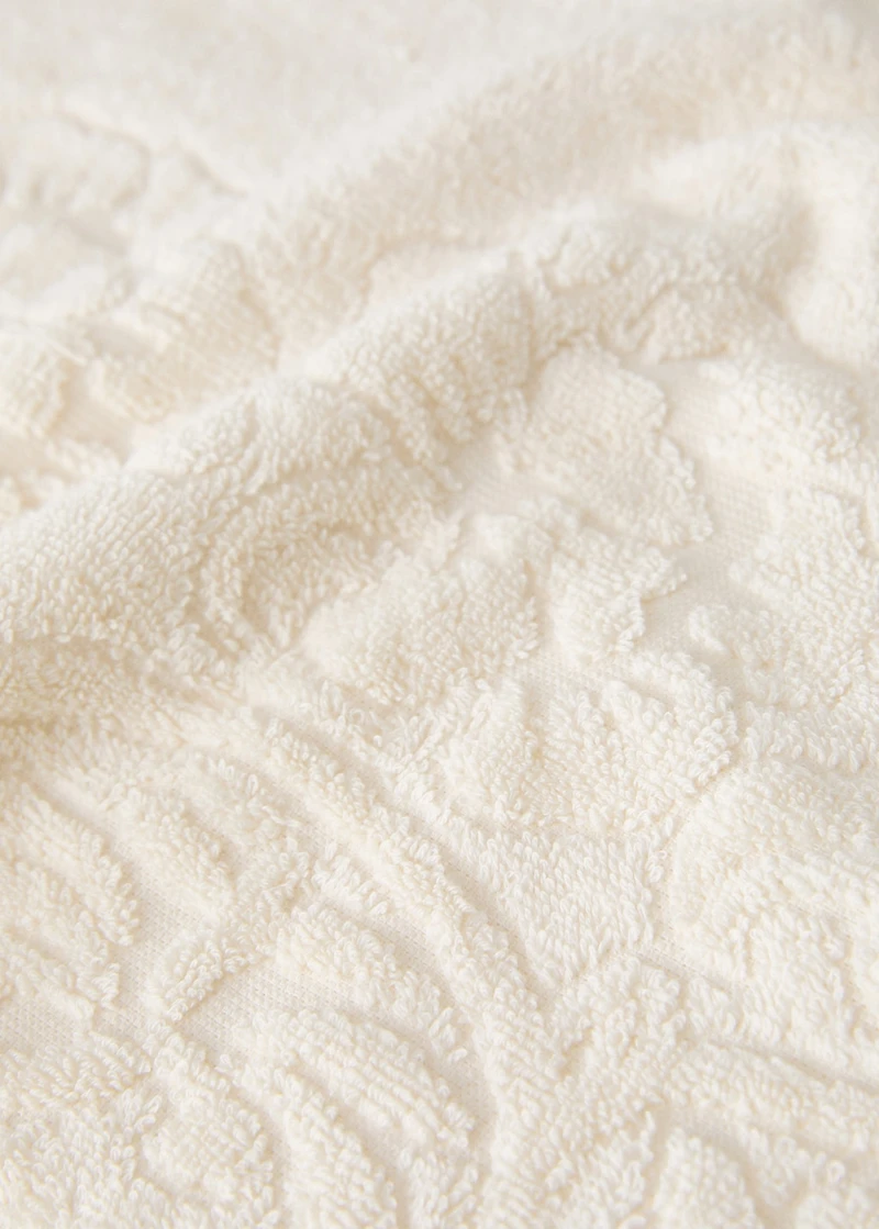 Hand towel with floral trim