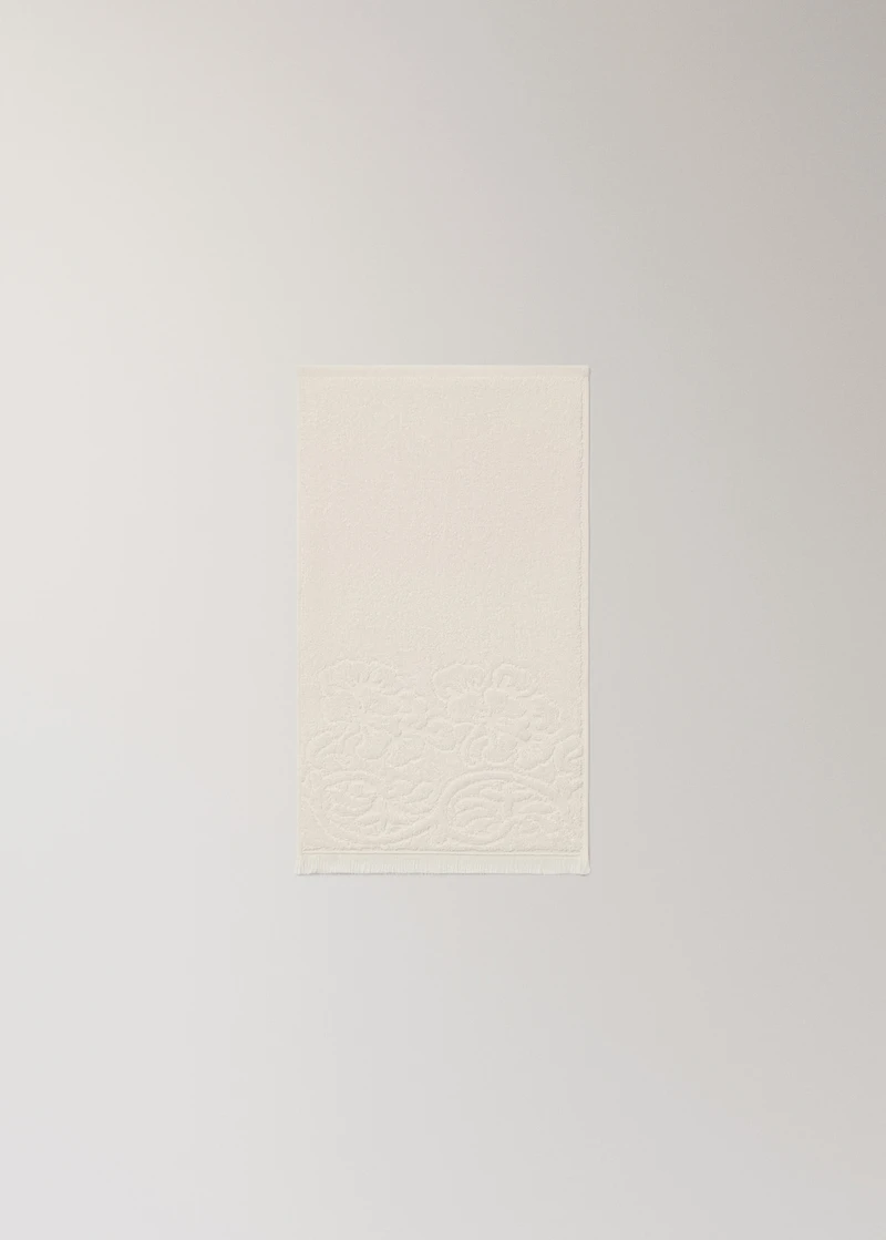 Hand towel with floral trim