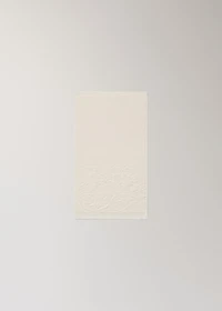 Hand towel with floral trim