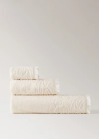 Washbasin towel with floral trim