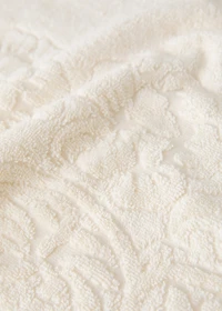 Washbasin towel with floral trim