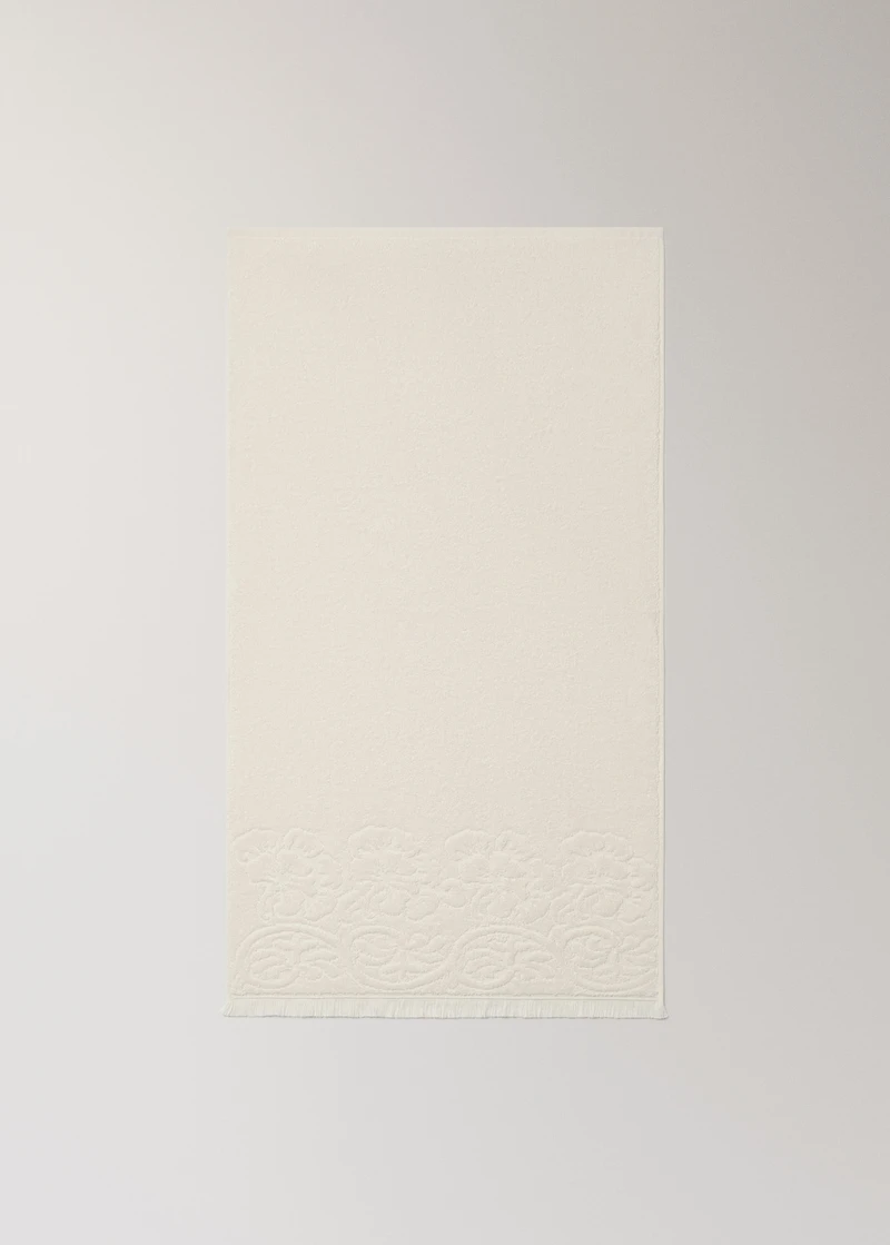 Washbasin towel with floral trim