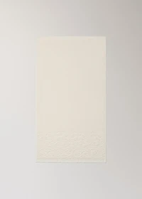 Washbasin towel with floral trim