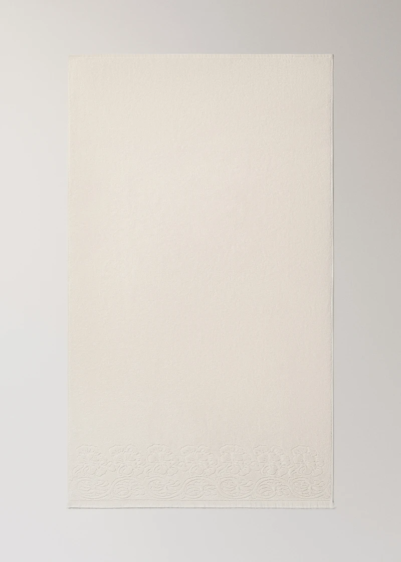 Bath towel with floral trim