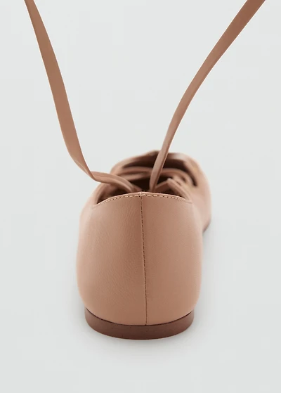 Leather ballet flats with crossed straps