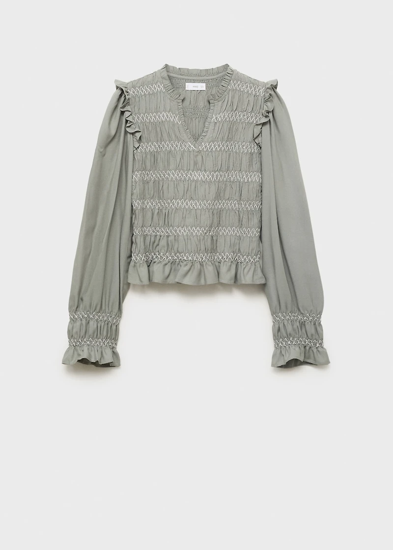 Ruffled blouse with embroidered details