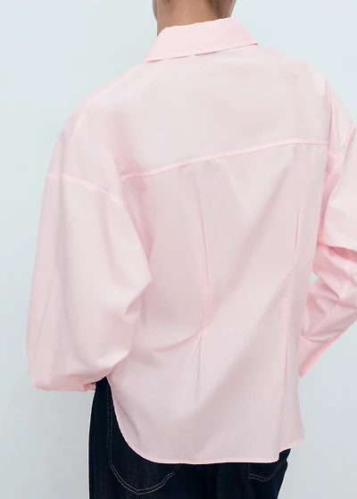 Shirt with pleats and pockets