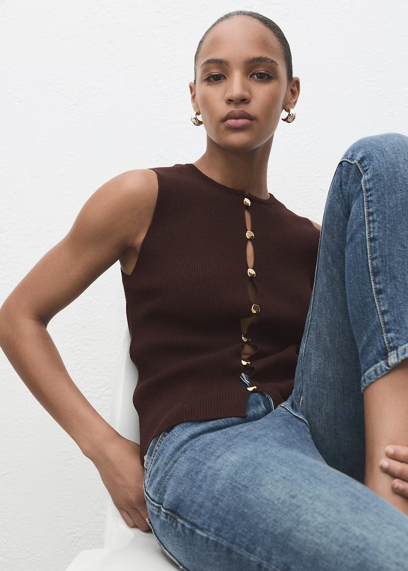 Knitted vest with slits