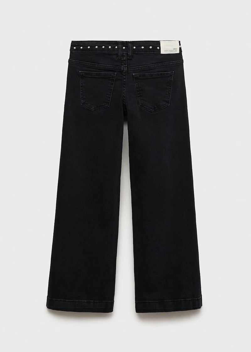 Low-waist studded jeans