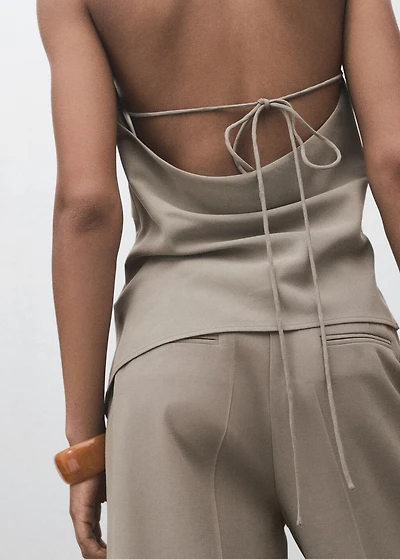 Asymmetrical open-back top