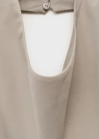 Asymmetrical open-back top