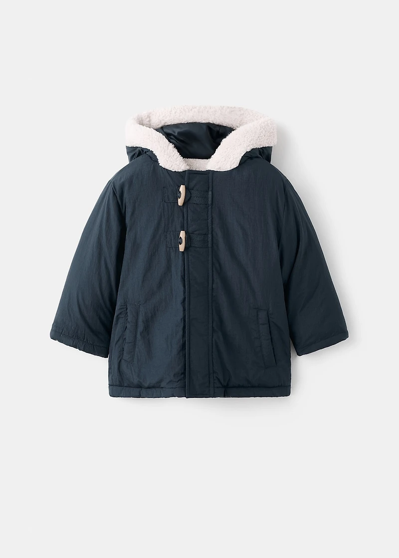 Hooded anorak with buttons