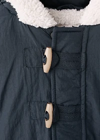 Hooded anorak with buttons