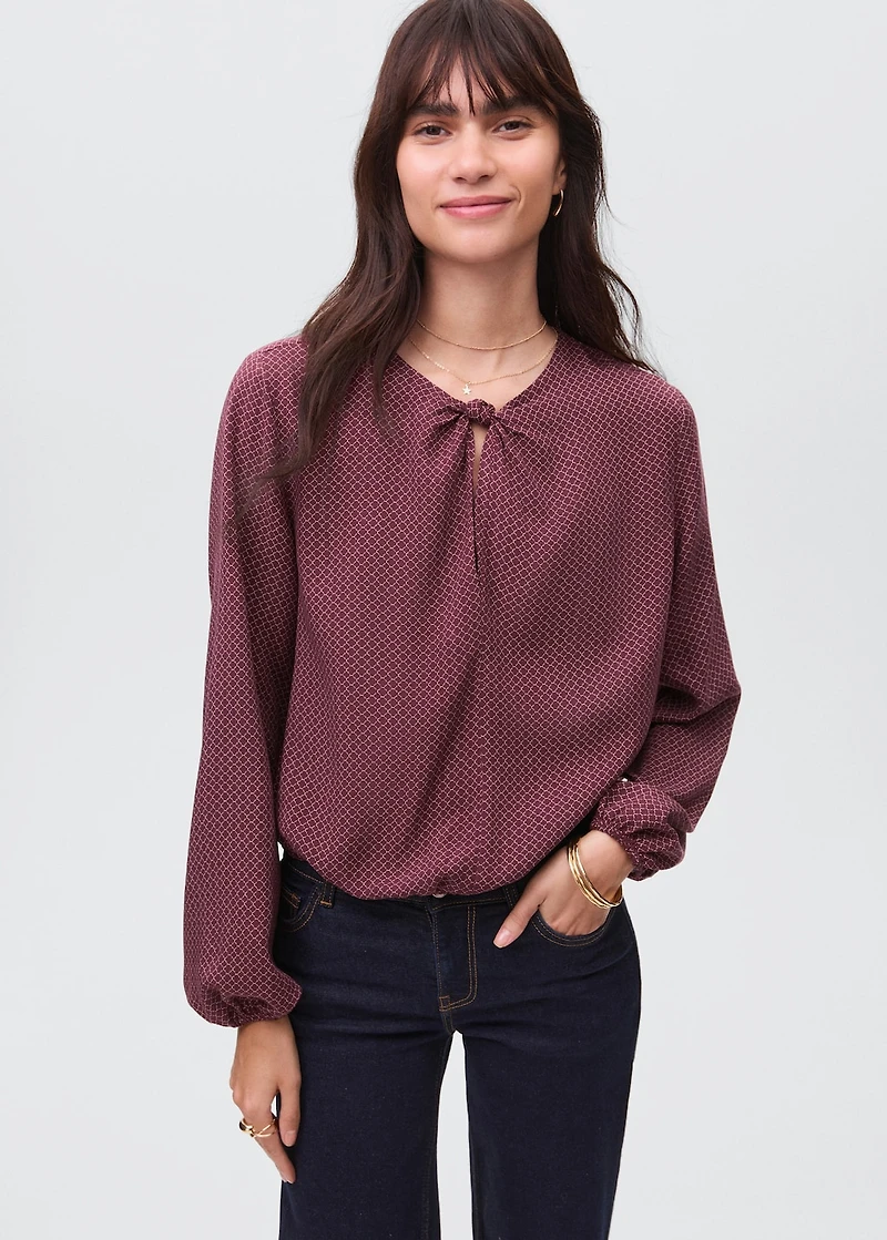 Puff-sleeved blouse with knot
